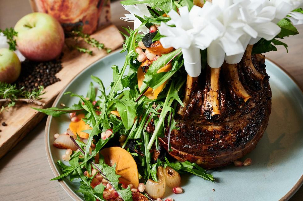 recipe chris cosentino s crown roast pork with persimmon dandelion pomegranate 7x7 bay area