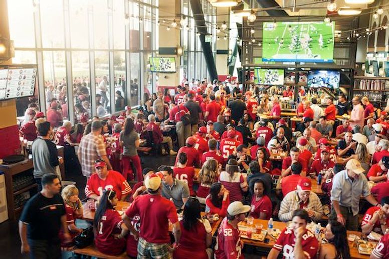 49ers fans put a Niners shirt on the Rocky statue 