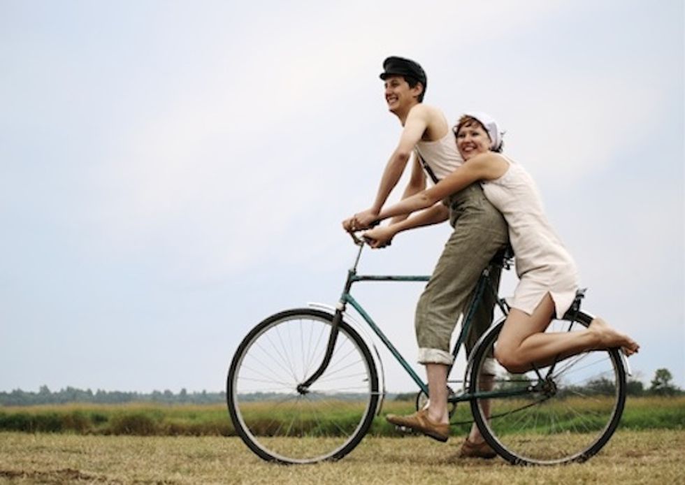 Любовь к велосипеду. Love Bike. Naked couple on Bicycle Single Xmas Card on your Bike.